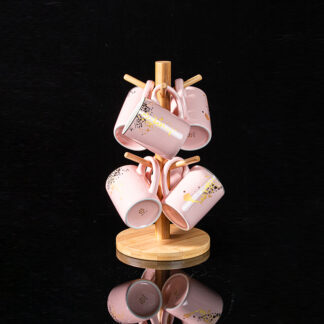 Tasa rosada con soporte de bambú